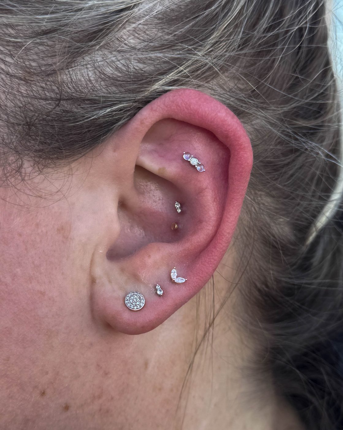 Ear curation featuring Second and Third Lobes, Double Conch and a Flat Helix