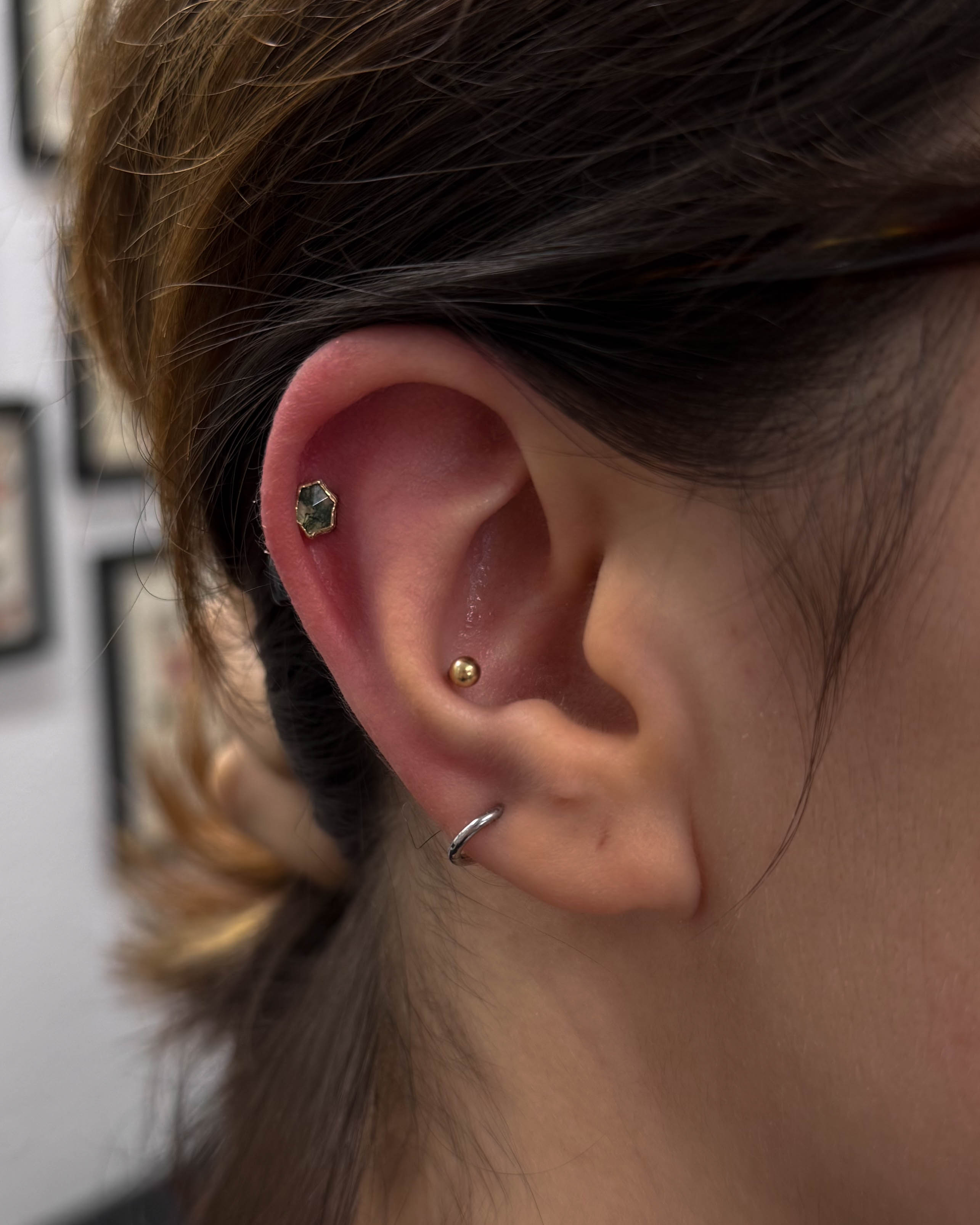 Ear curation with gemstone jewellery by Stab Daddy Bri